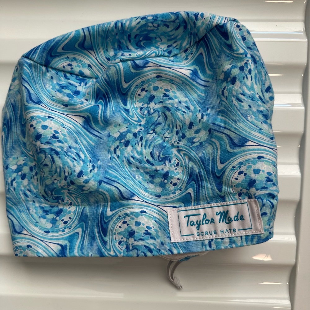 TaylorMade Blue Swirl Patterned Cap. Lined
